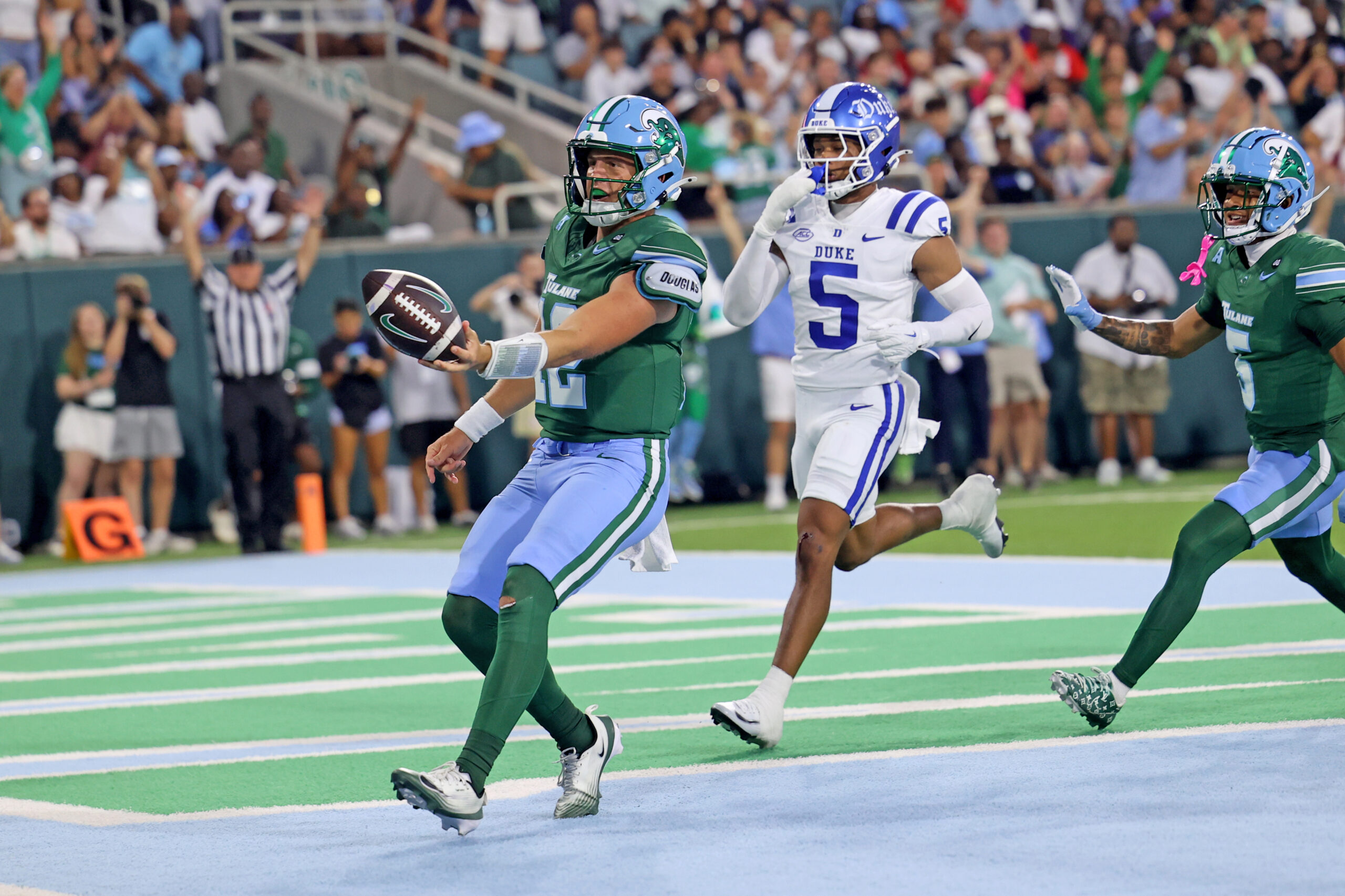 Retzlaff runs wild as Tulane slides past Mensah, Duke 34-27